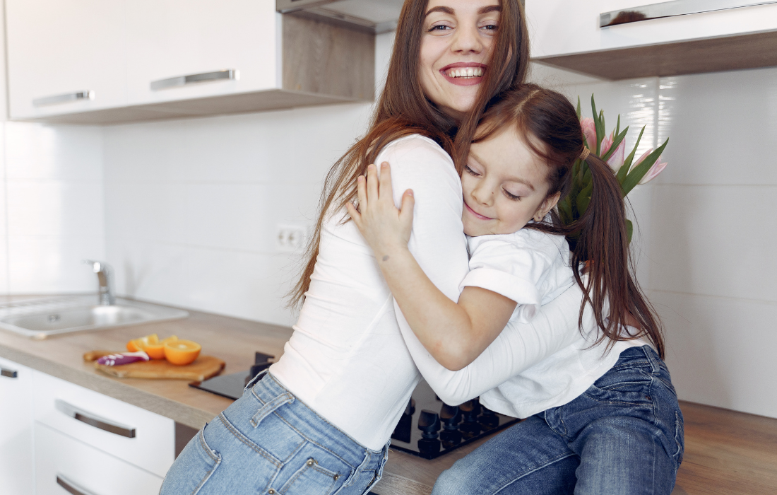 Mom and daughter hugging